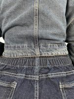 شلوار جین زنانه شافل سرمه ای بغل تینت