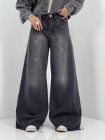 شلوار جین زنانه شافل بگ زغالی با سنگشور صدفی از بغل