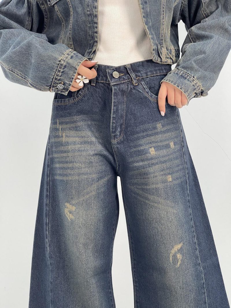 شلوار جین زنانه شافل بگ سرمه ای با سنگشور خاص