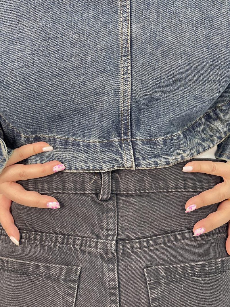 شلوار جین زنانه شافل بگ با سنگشور کرم قهوه ای