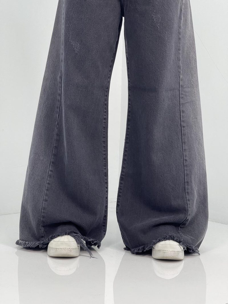 شلوار جین زنانه شافل بگ زغالی با سنگشور صدفی از بغل