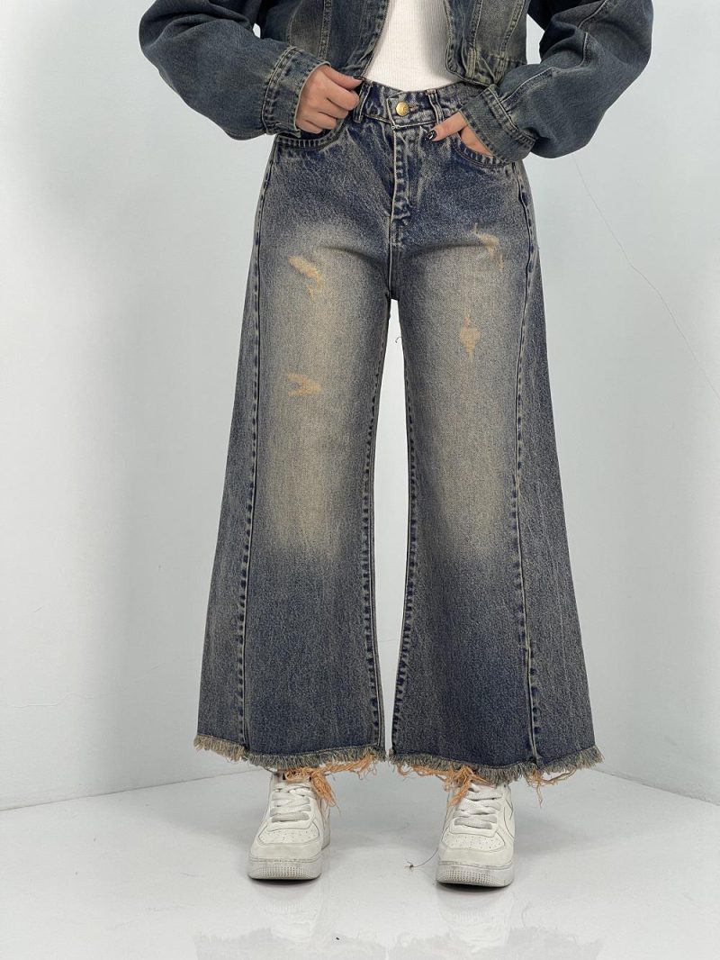 شلوار جین زنانه شافل قد نود آبی با سنگشور کرم قهوه ای