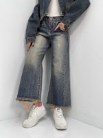 شلوار جین زنانه شافل قد نود آبی با سنگشور کرم قهوه ای