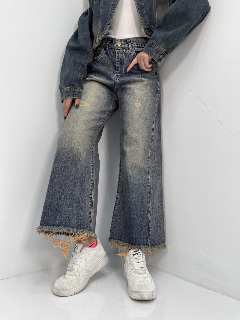 شلوار جین زنانه شافل قد نود آبی با سنگشور کرم قهوه ای