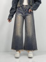 شلوار جین زنانه شافل قد نود آبی با سنگشور کرم قهوه ای