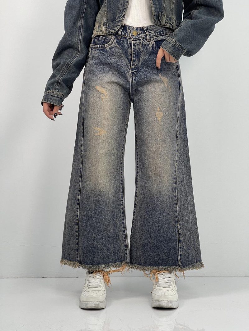 شلوار جین زنانه شافل قد نود آبی با سنگشور کرم قهوه ای