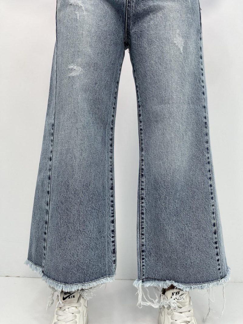 شلوار جین زنانه شافل قد نود رنگ آبی یخی