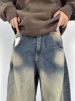 شلوار جین زنانه بالونی آبی با سنگشور کرم