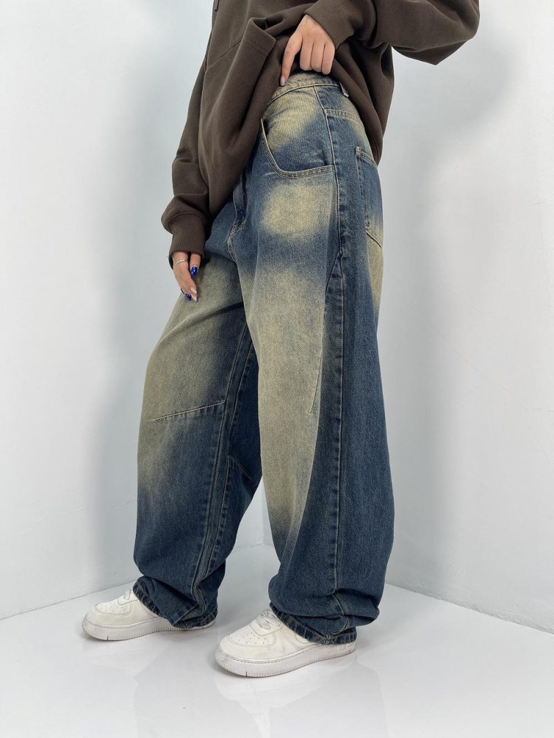 شلوار جین زنانه بالونی آبی با سنگشور کرم