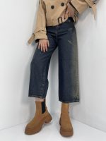 شلوار جین زنانه واید لگ با سنگشور کرم بغل