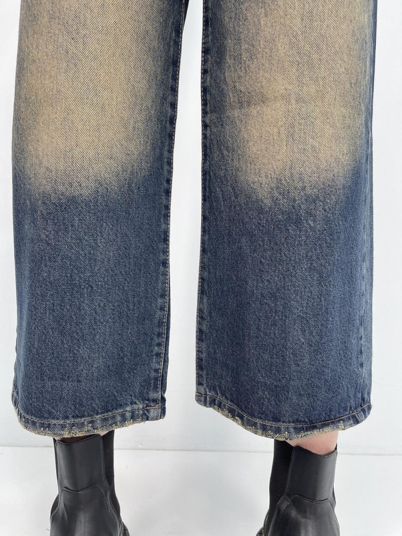 شلوار جین زنانه واید لگ سرمه ای با سنگشور کرم