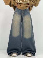 شلوار جین زنانه سوپر بگ آبی با تینت سبز سنگشور کرم