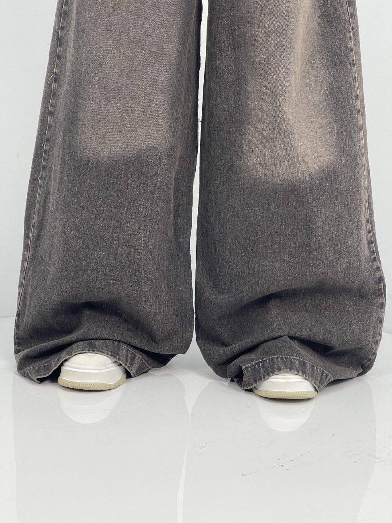 شلوار جین زنانه سوپر بگ زغالی با سنگشور کرم قهوه ای