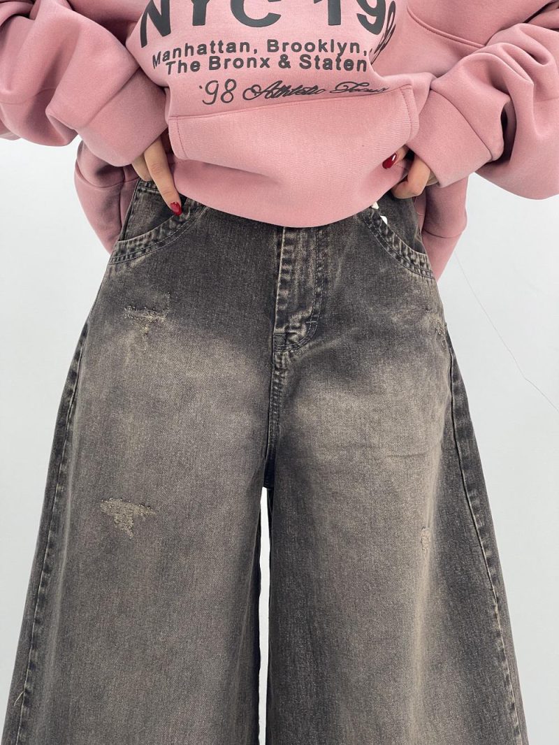 شلوار جین زنانه سوپر بگ زغالی با سنگشور کرم قهوه ای