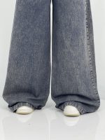 شلوار جین زنانه سوپر بگ سرمه ای با ترکیب کرم خاکی
