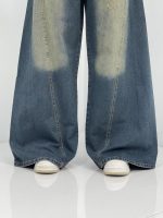 شلوار جین زنانه شافل آبی با سنگشور سبز سایز بزرگ