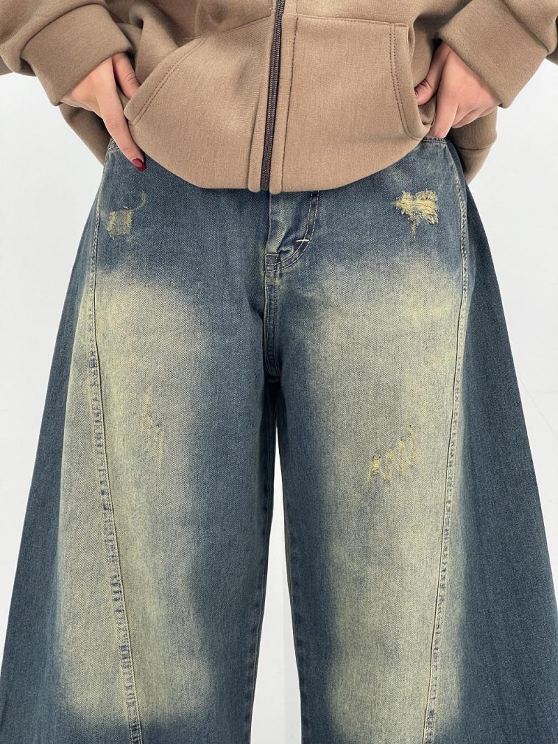 شلوار جین زنانه شافل آبی با سنگشور سبز سایز بزرگ