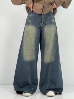 شلوار جین زنانه شافل آبی با سنگشور سبز سایز بزرگ