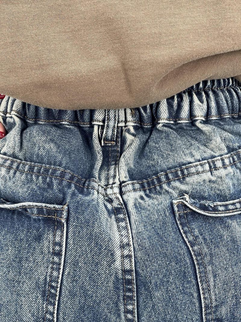 شلوار جین زنانه نیم بگ با سنگشور کرم