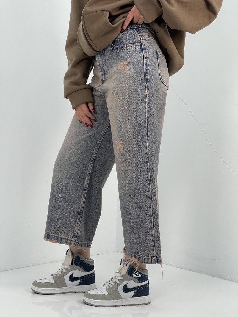 شلوار جین زنانه واید لگ آبی با سنگشور کرم