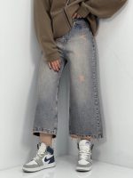 شلوار جین زنانه واید لگ آبی با سنگشور کرم