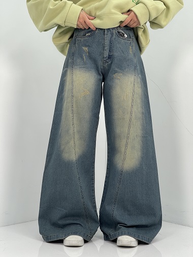 شلوار جین زنانه شافل سبز با سنگشور کرم