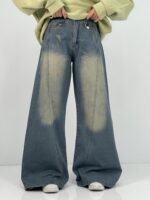 شلوار جین زنانه شافل سبز با سنگشور کرم