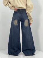 شلوار جین زنانه شافل سرمه ای با سنگشور کرم