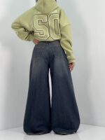 شلوار جین زنانه سرمه ای با سنگشور کرم